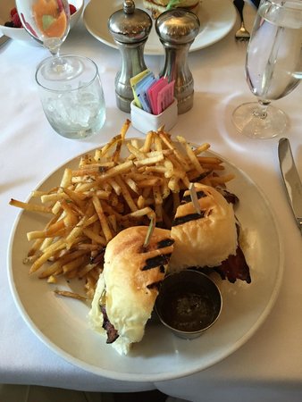 Proof on Main signature dishes  Menu changes seasonally, but often includes dishes like Roasted Chicken, Bison Burger, Charcuterie Boards featuring local products, and innovative vegetable preparations. Their brunch is also popular.